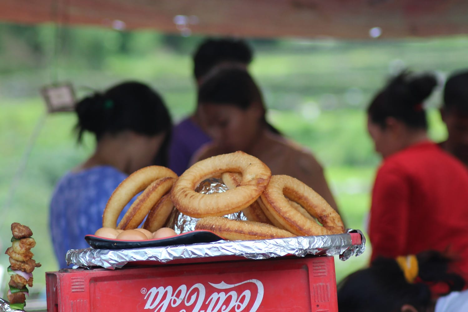 Freshly made sel roti being sold at a festival in Nepal